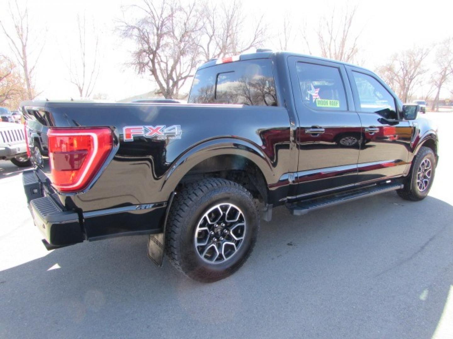 2021 Agate Black Metallic /Gray Ford F-150 XLT Sport FX4 SuperCrew 4WD (1FTFW1E54MF) with an 5.0L V8 OHV 16V engine, 10A transmission, located at 4562 State Avenue, Billings, MT, 59101, (406) 896-9833, 45.769516, -108.526772 - 2021 Ford F-150 XLT Sport FX4 SuperCrew 4WD - One owner - Not your average XLT! 5.0L V8 OHV 16V engine - 10 speed automatic transmission - 4WD - 47,142 miles - One owner - Sweet truck! XLT Sport FX4 package - climate control - tilt and telescoping steering wheel - cruise control - twin panel m - Photo#4